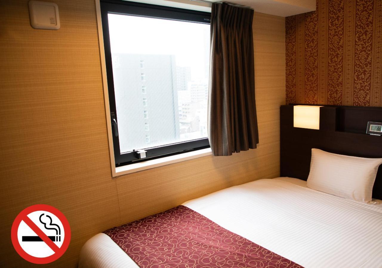 Hotel. Links Namba Ósaka Pokoj fotografie