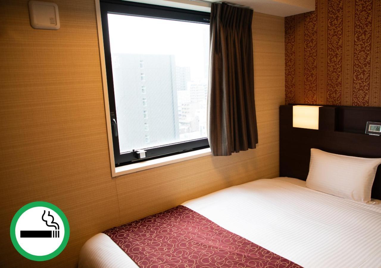 Hotel. Links Namba Ósaka Pokoj fotografie